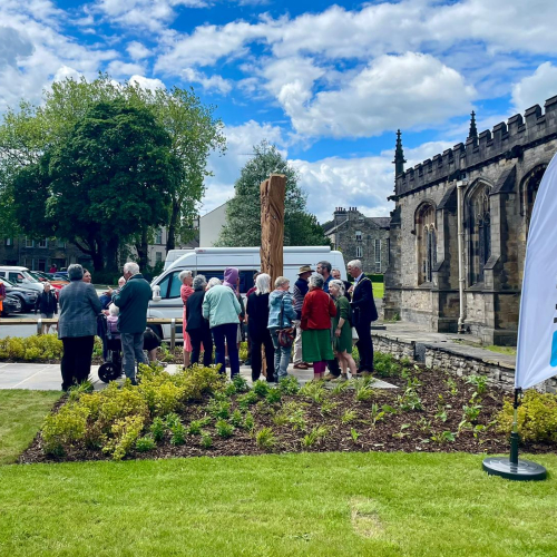 people stood at an unveiling ceremony