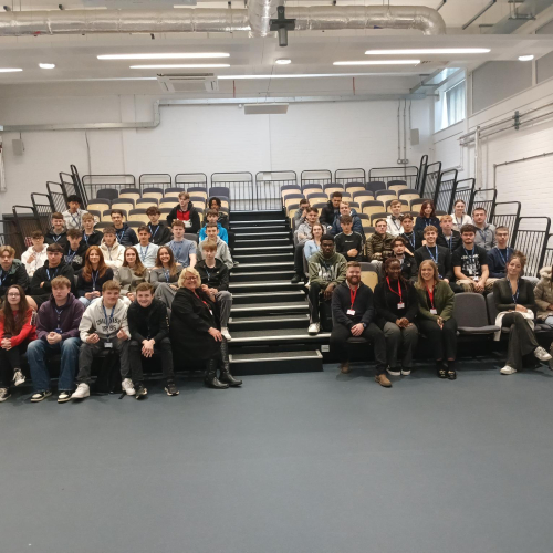 Students sat in a lecture hall.