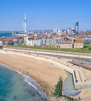 promenade beach front blue sea and blue skies 