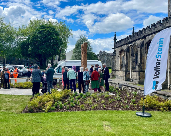 people stood at an unveiling ceremony