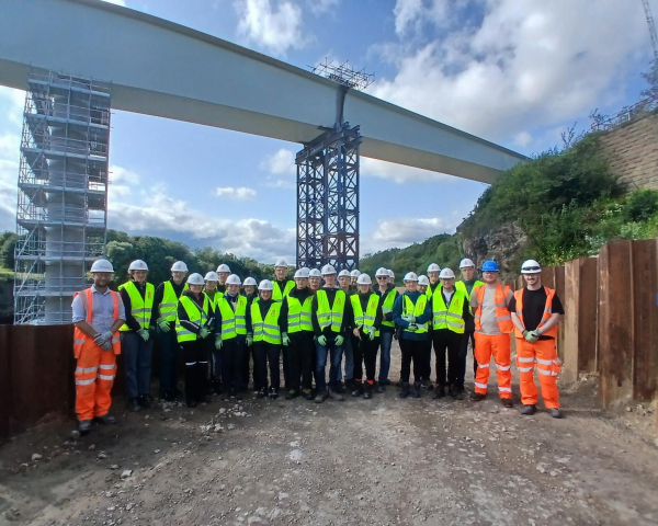 Group of university students on site at Wear Bridge.