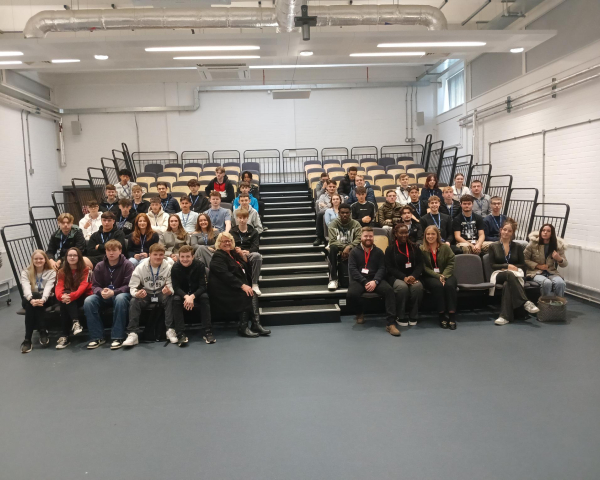 Students sat in a lecture hall.