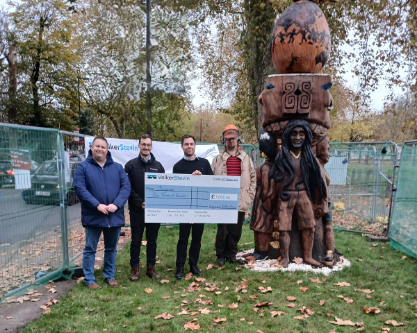 Presenting a giant cheque to an artist. 