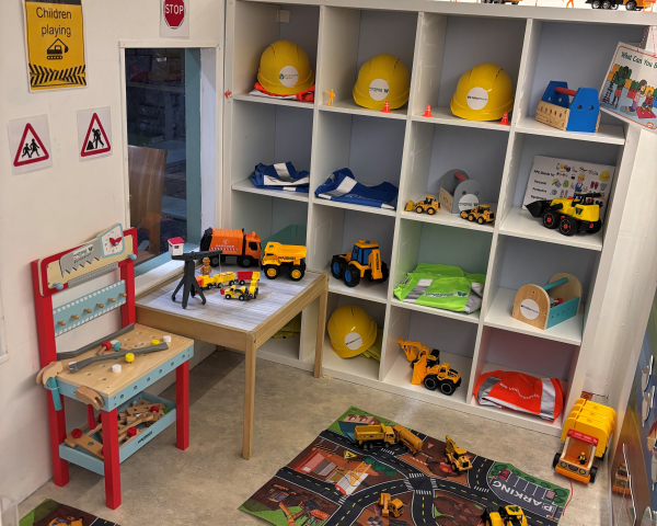Room filled with construction toys