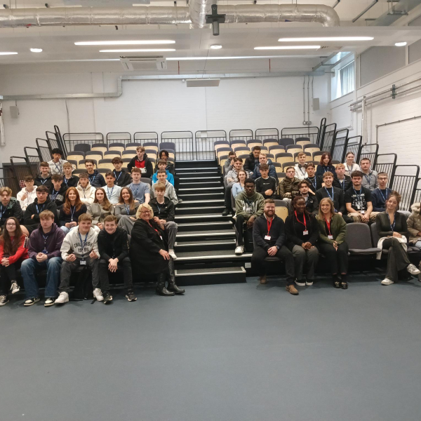 Students sat in a lecture hall.