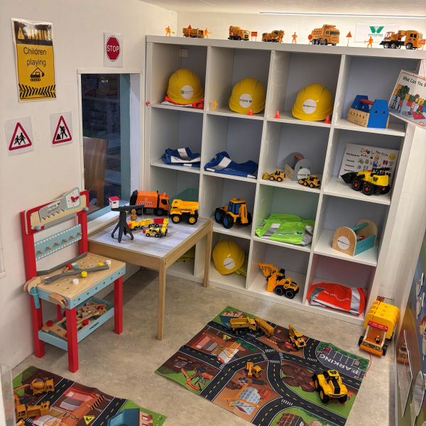 Room filled with construction toys