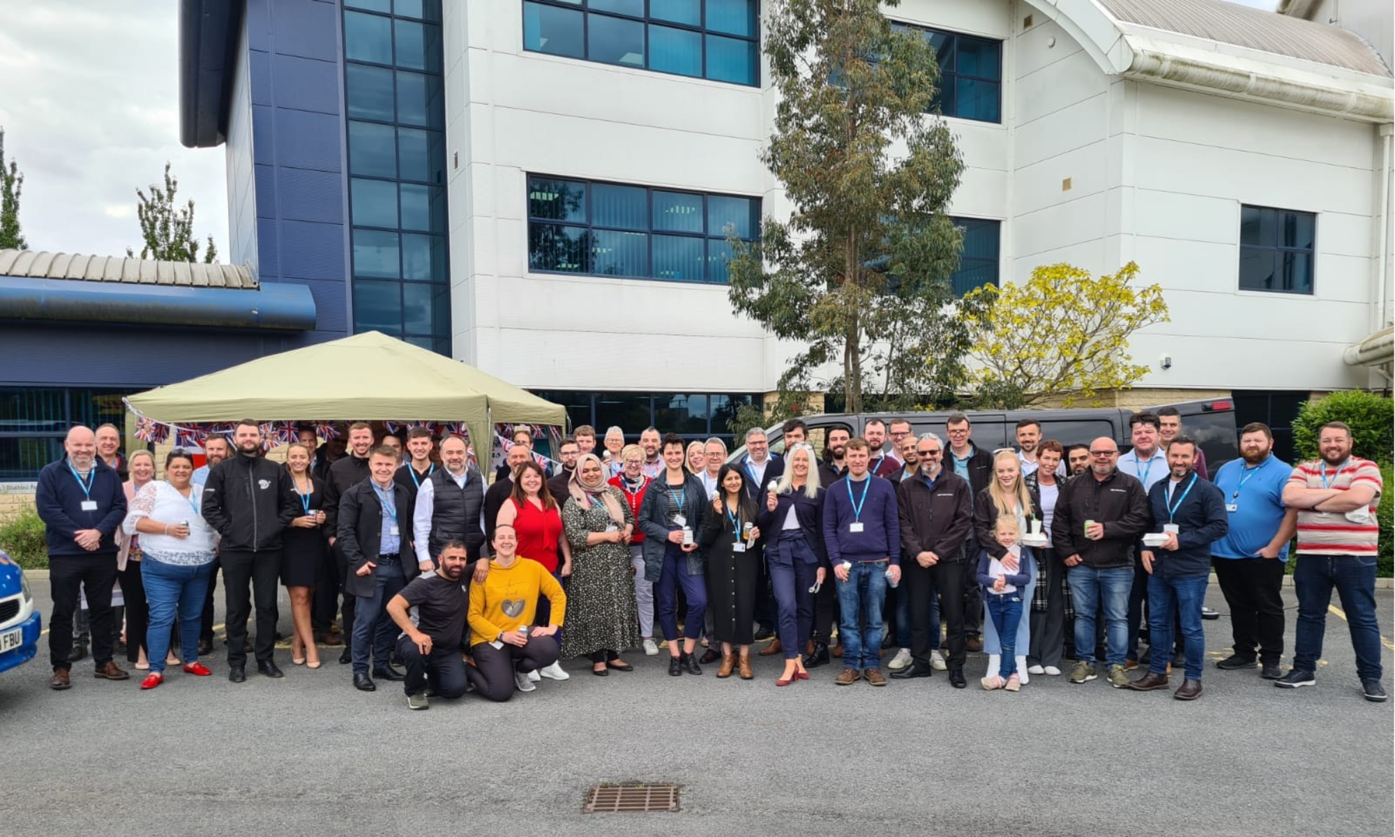 VolkerStevin staff outside at a BBQ.