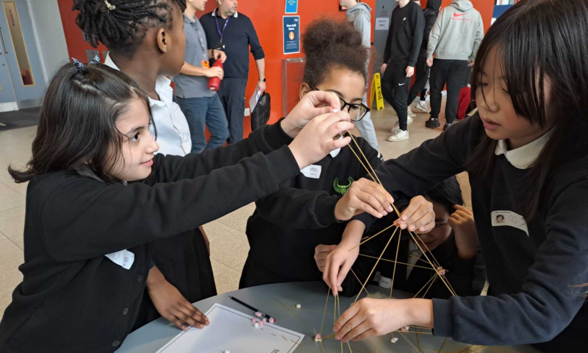 Children completing a STEM activity.