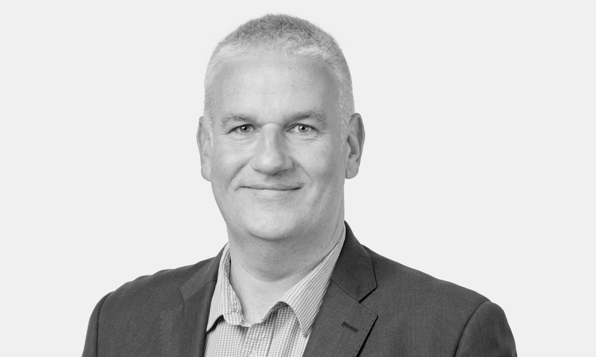 Picture of a man smiling.