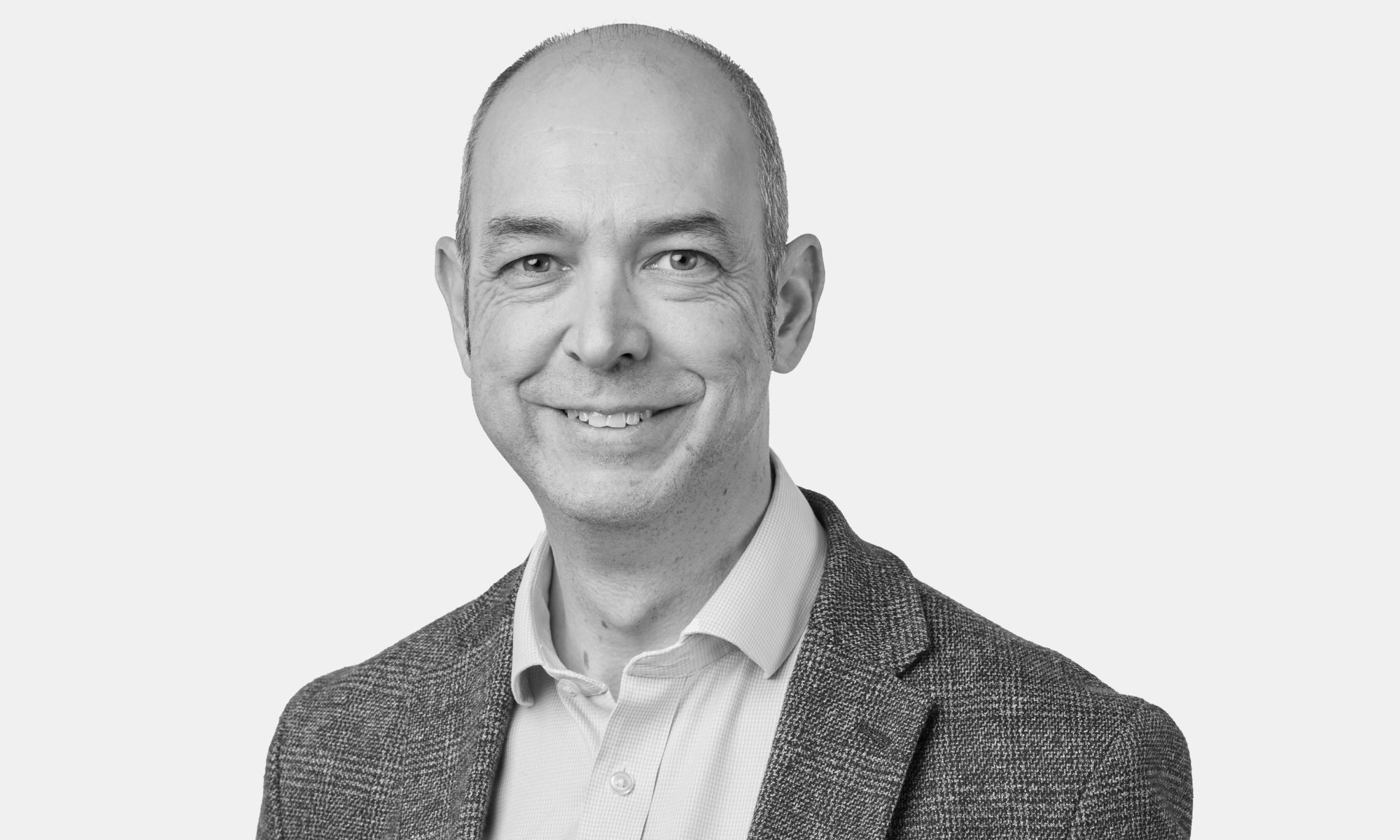 Picture of a man smiling.